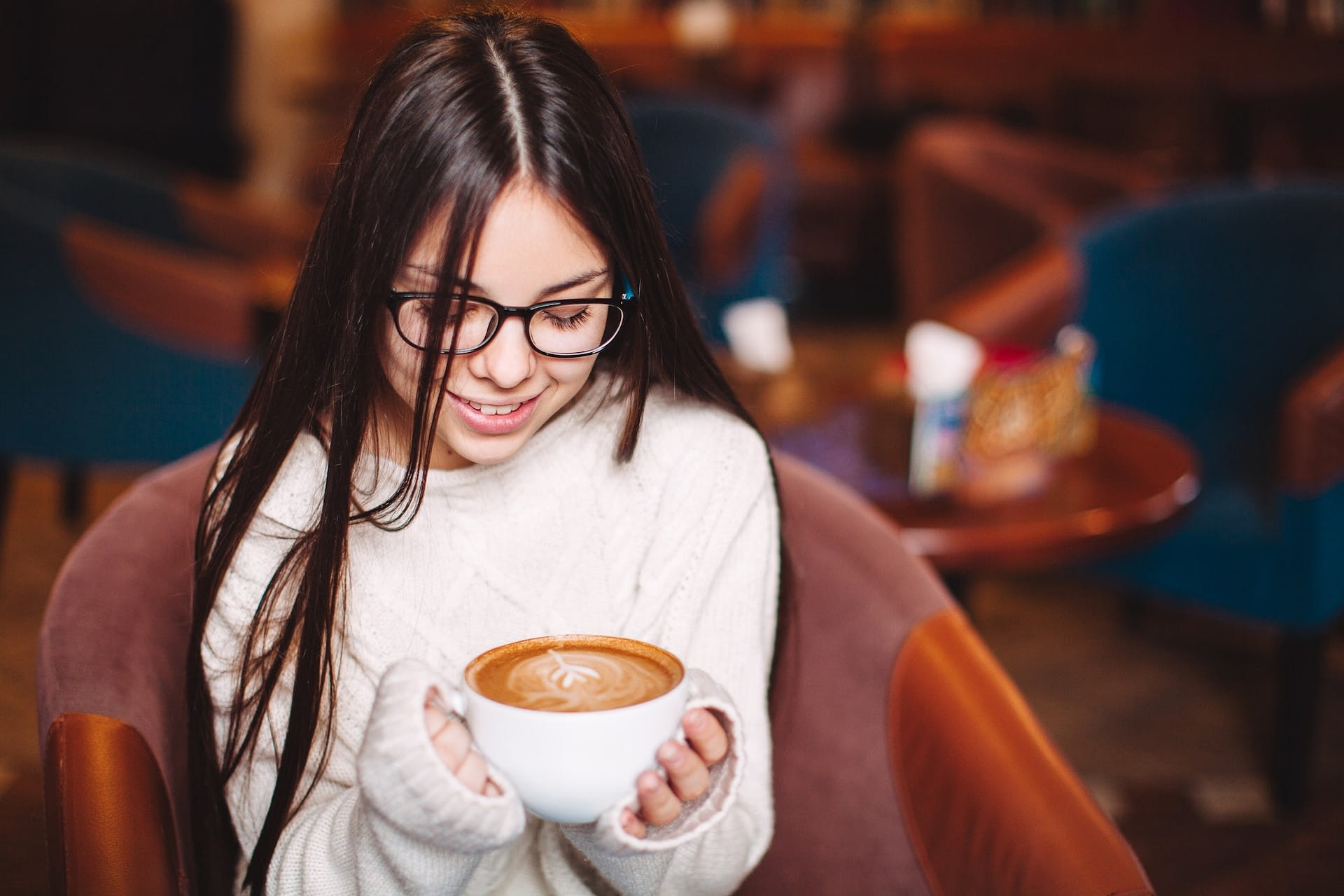 young beauty brunette with cup of coffee