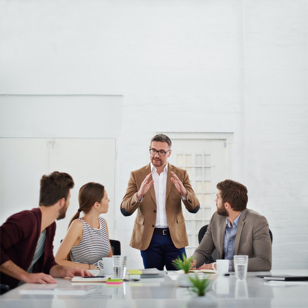 brainstorming session shot of a group of businesspeople in the boardroom