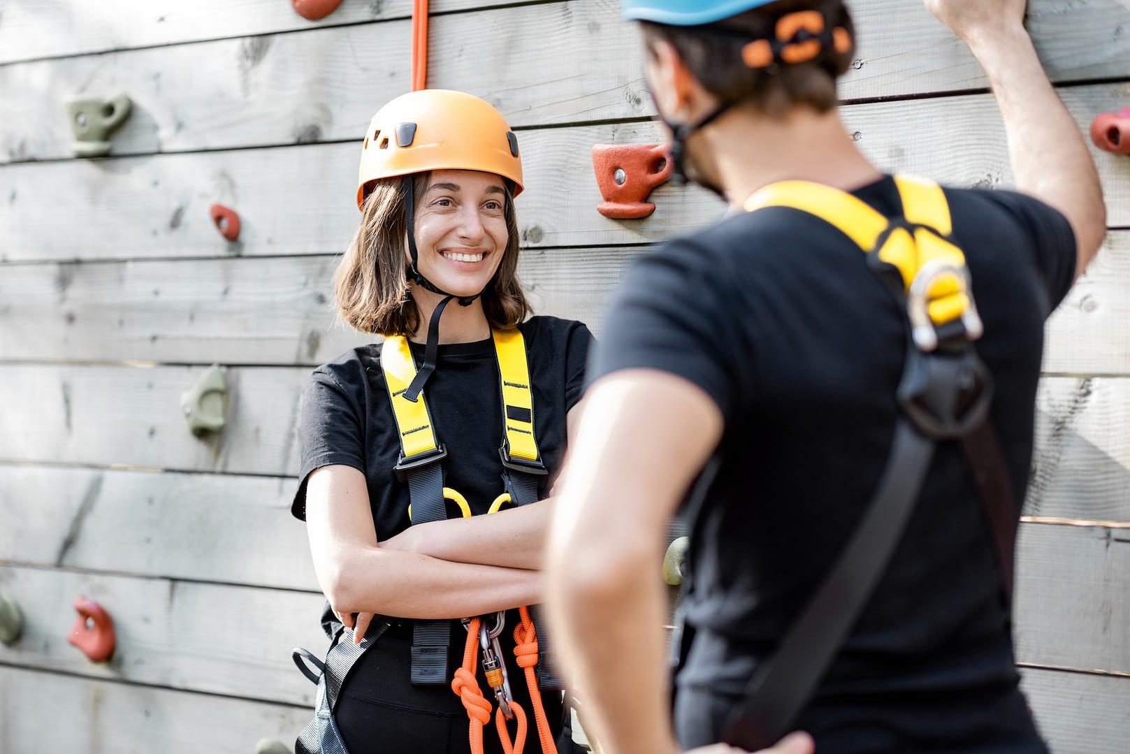 well equipped couple near the climbing wall