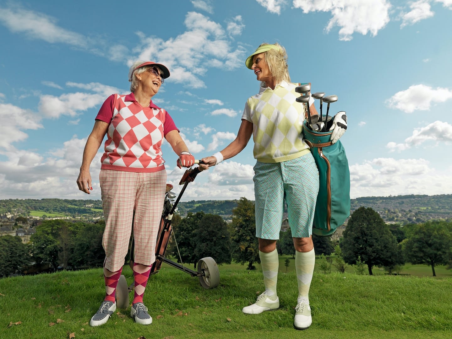 mature ladies playing golf