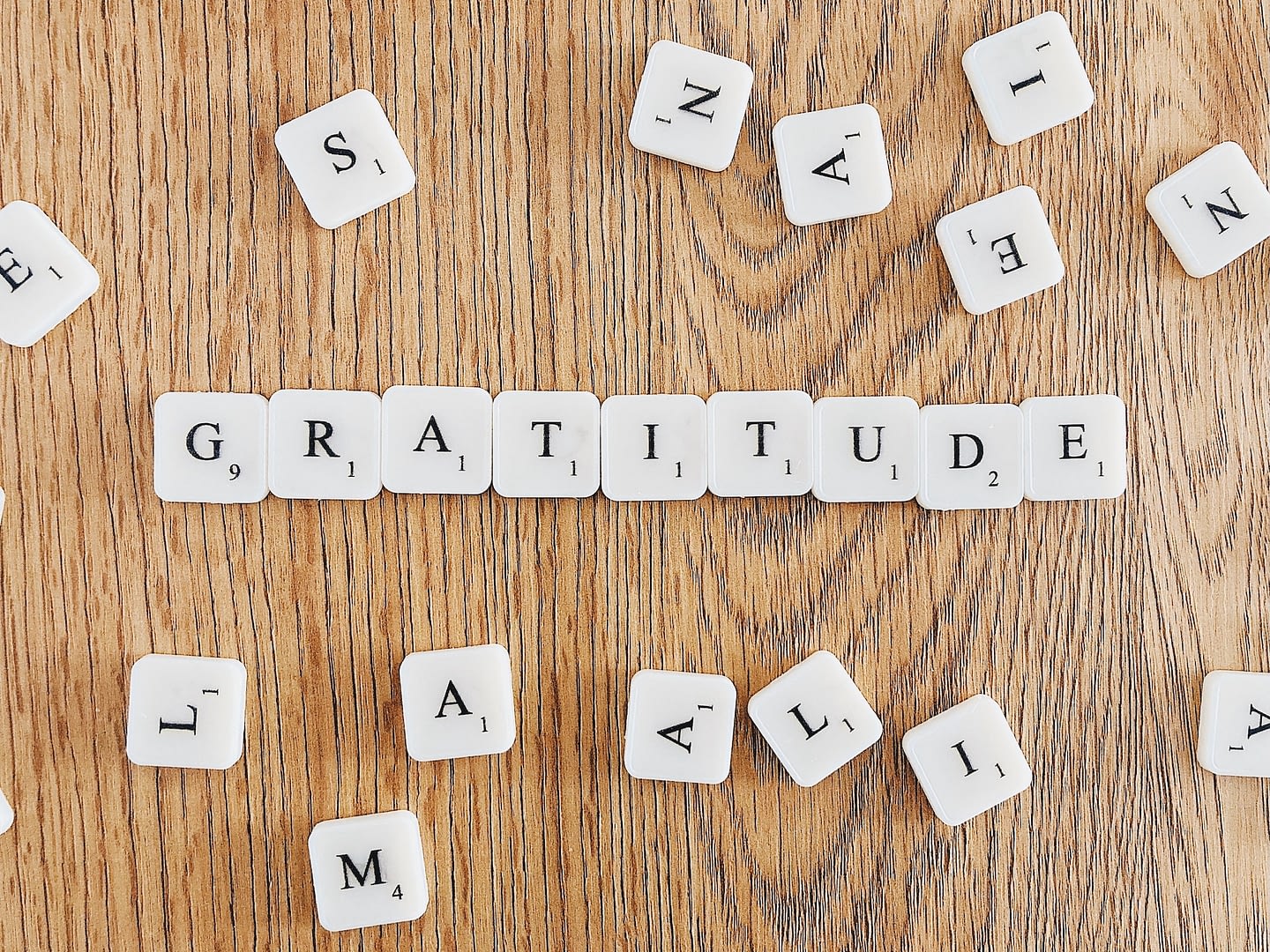 gratitude written with scrabble tiles