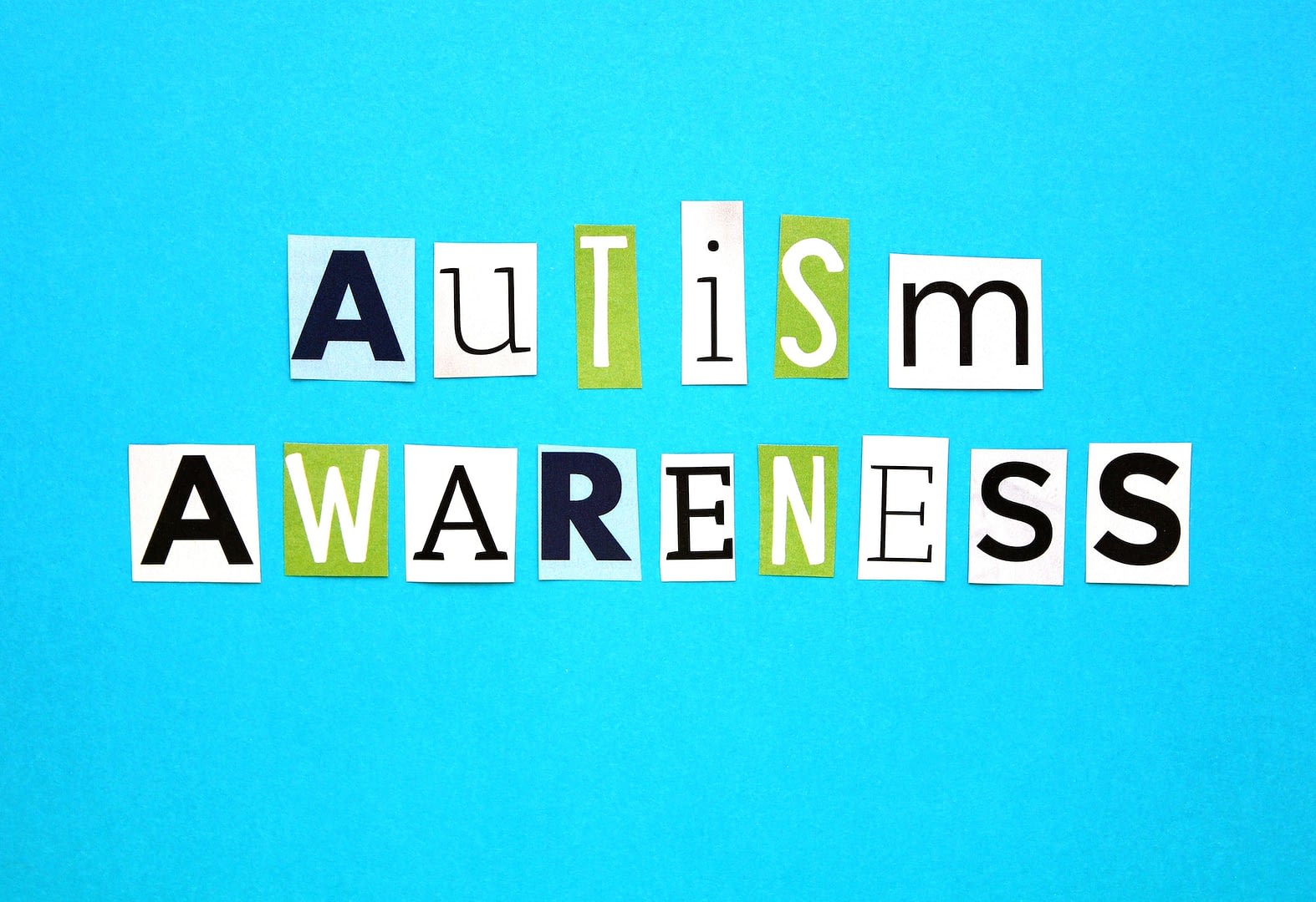 april is autism awareness month words flat lay style