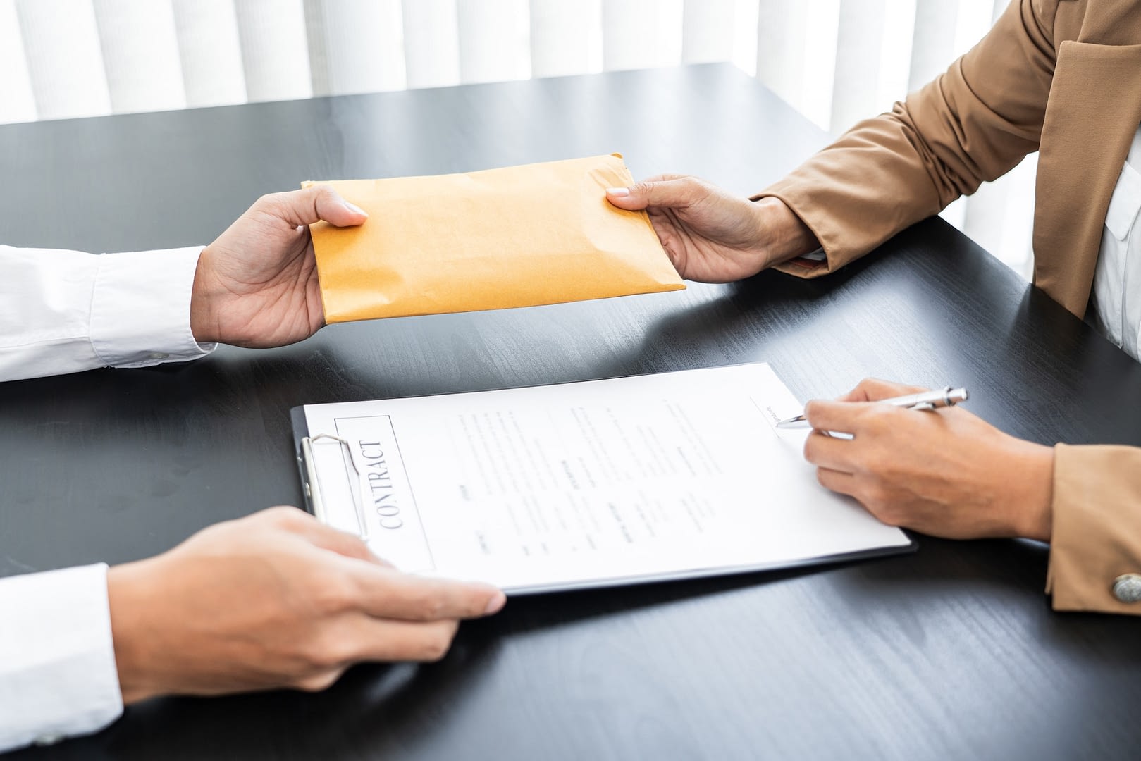 businessmen give money to bribe partner secretly passing money bribery and corruption concepts