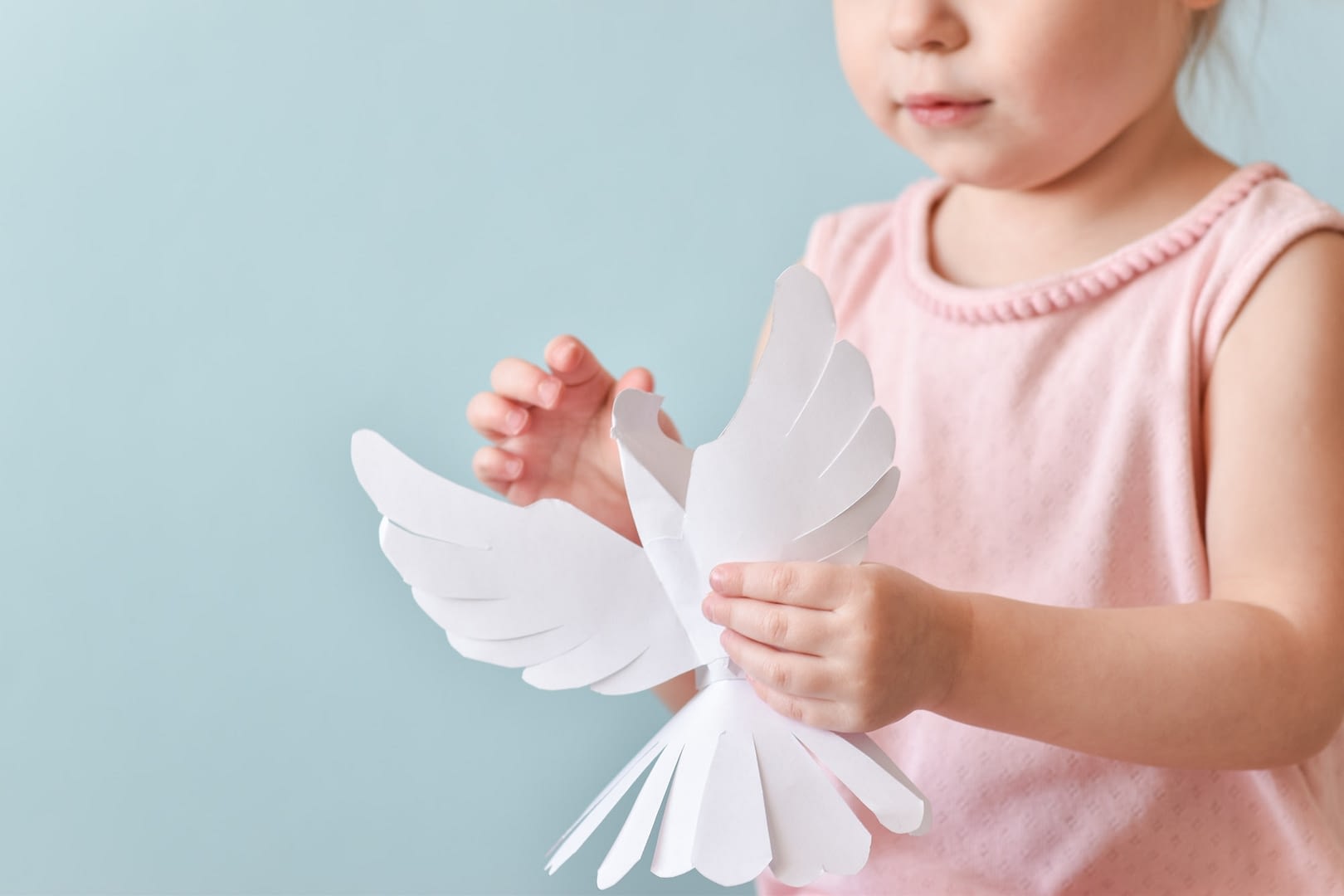 a symbol of peace in the hands of a child