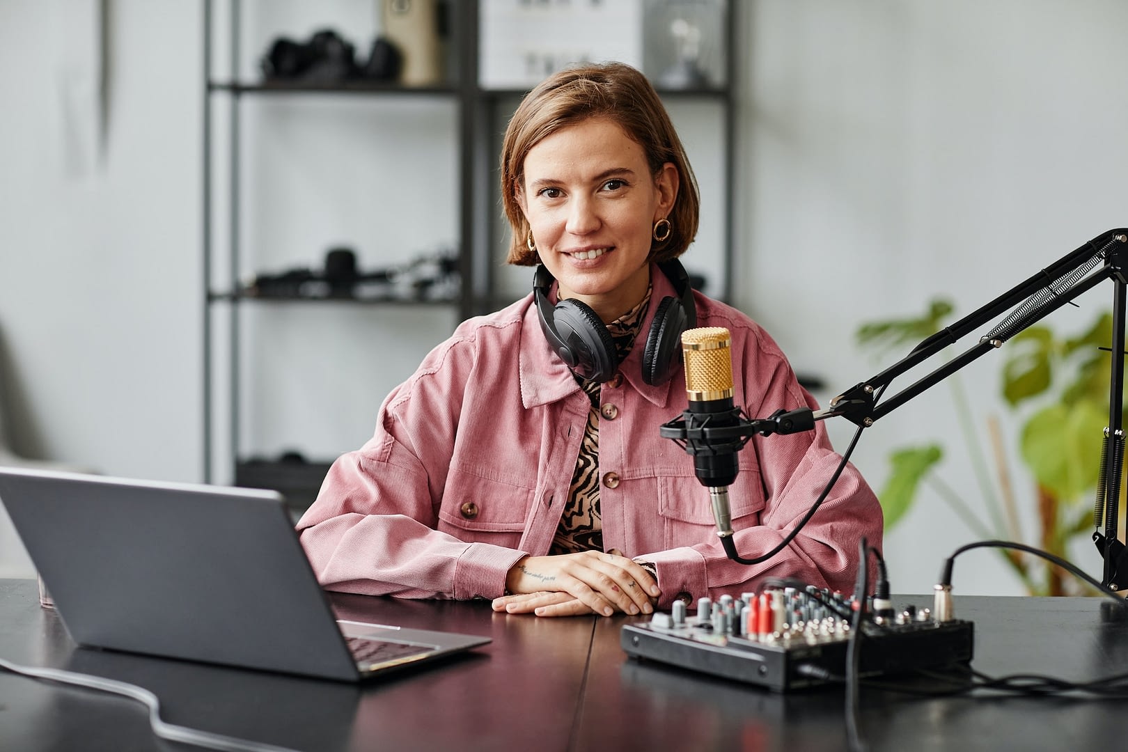 female podcaster smiling