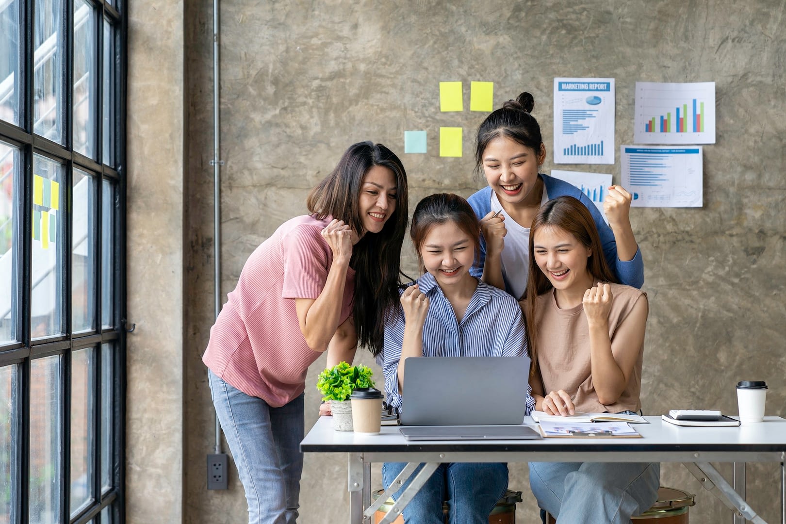 business team meeting smiling happy with success brainstorming discussing financial audits plannin