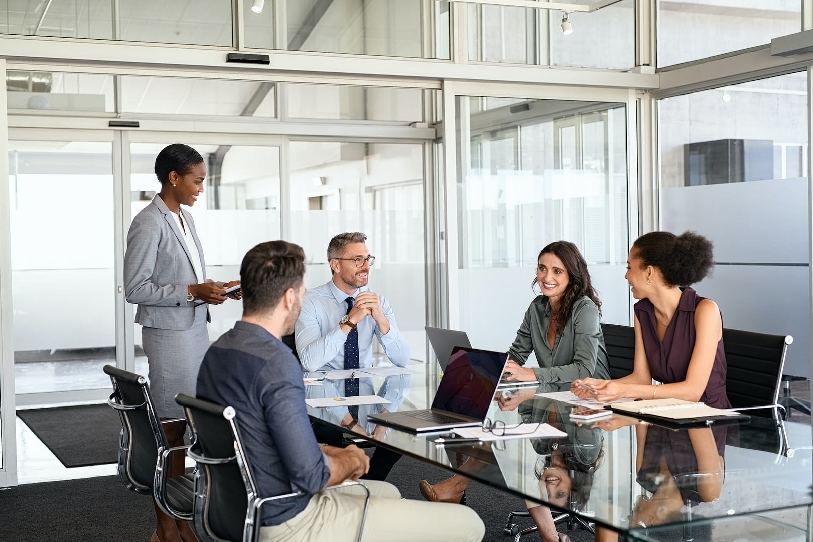 formal business people in meeting room