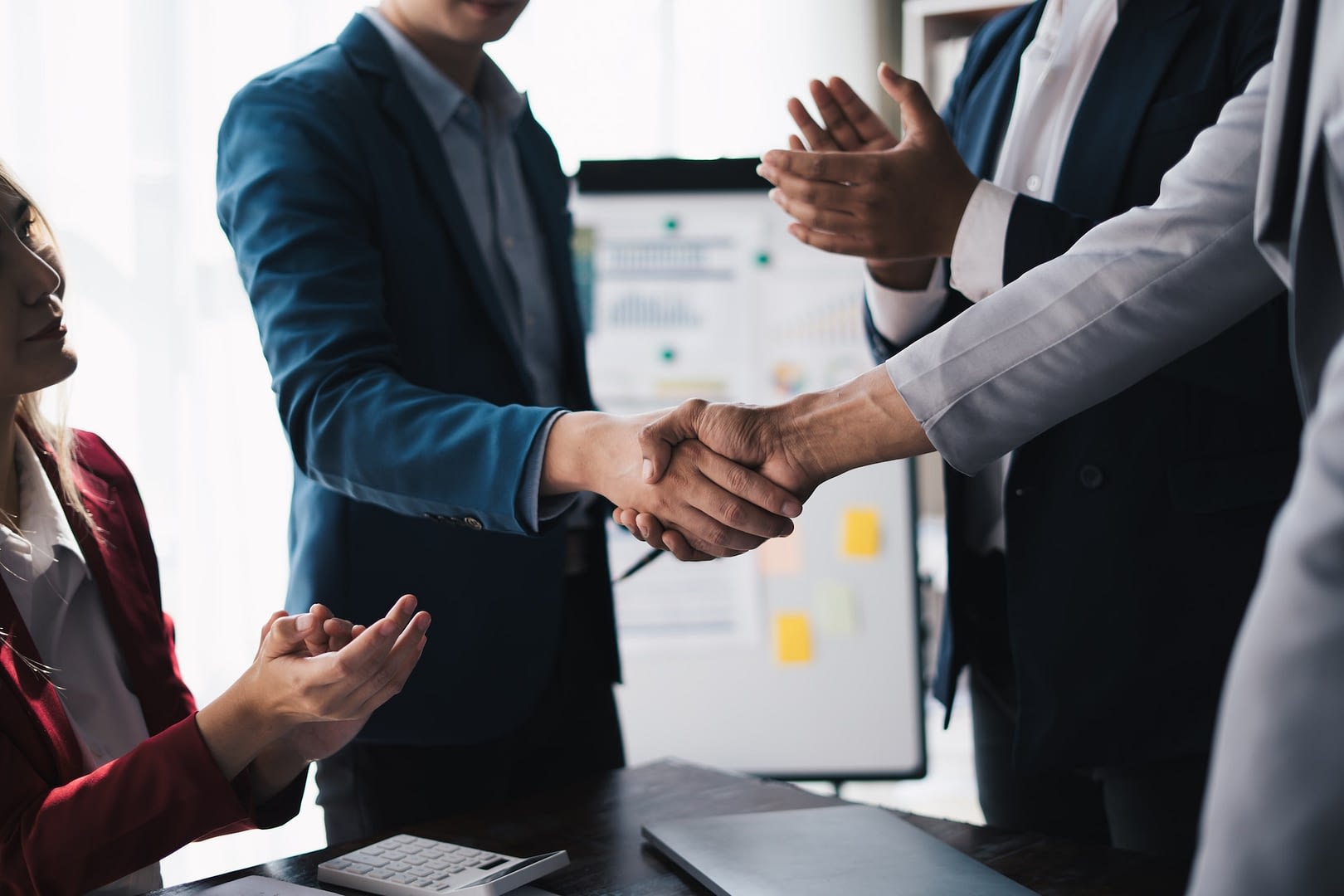 professional businessman shaking client hand closing successful deal