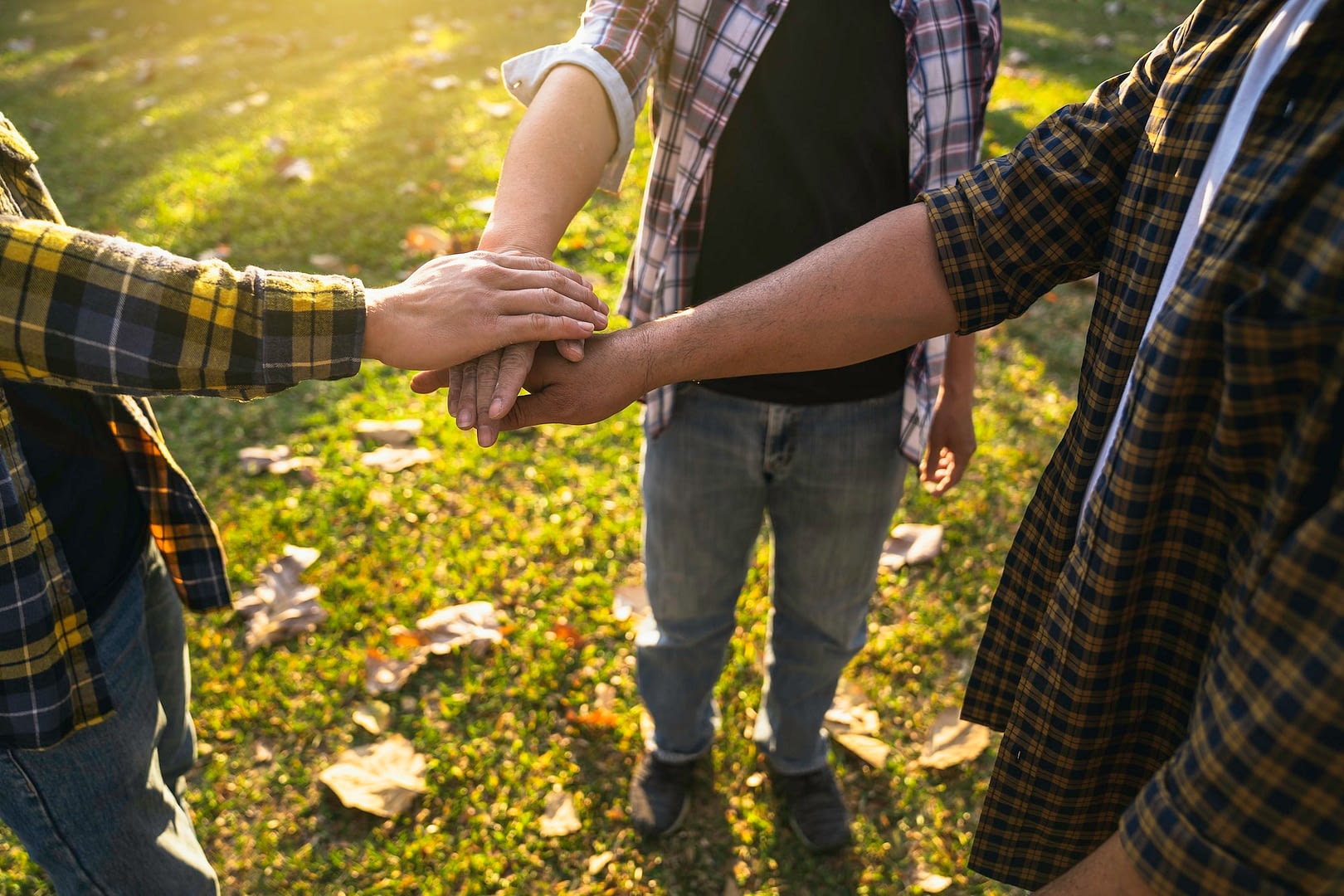 volunteer hand stack people to show teamwork spirit togetherness concept community of charity peopl