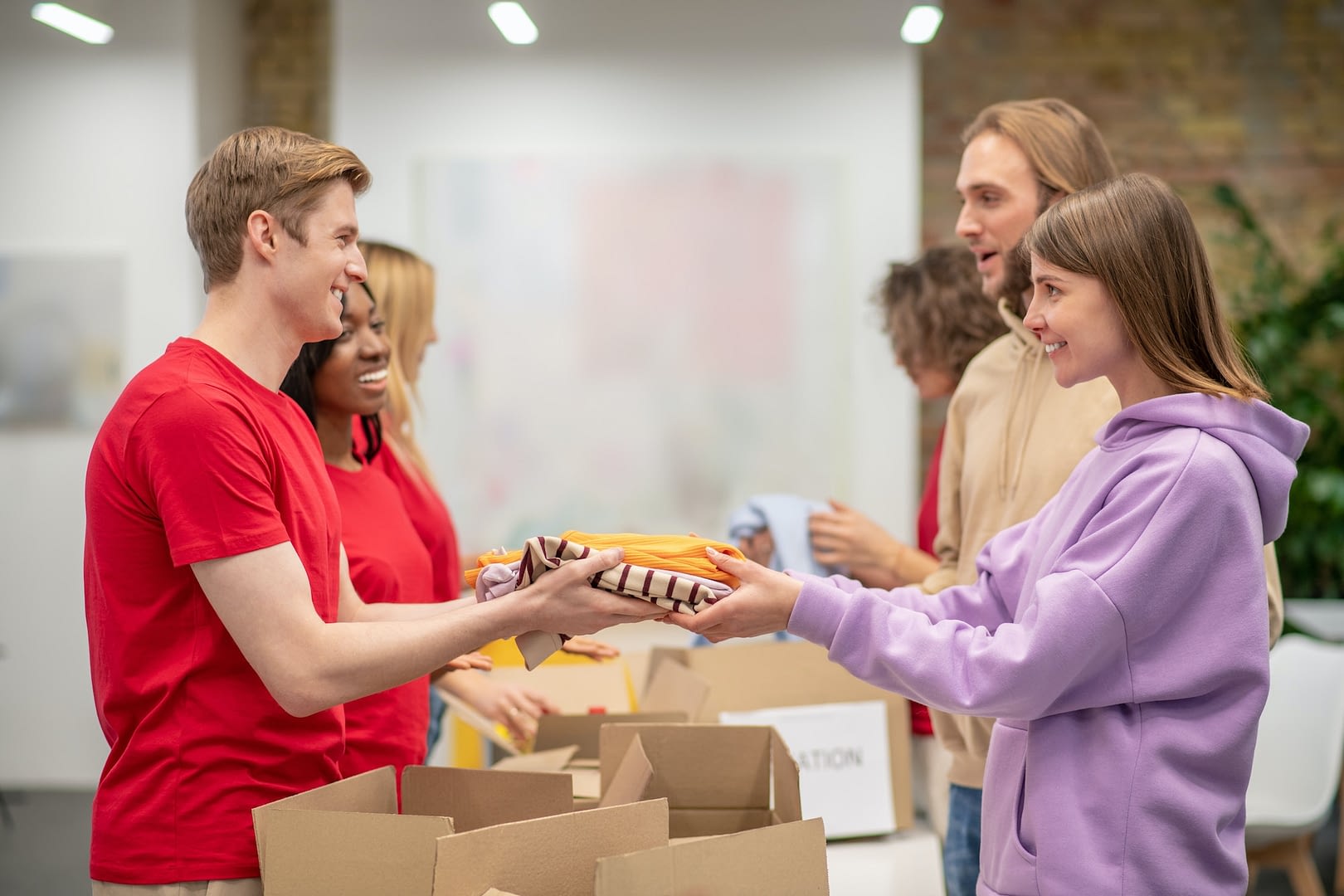 workers of the non profit organization distributing donations