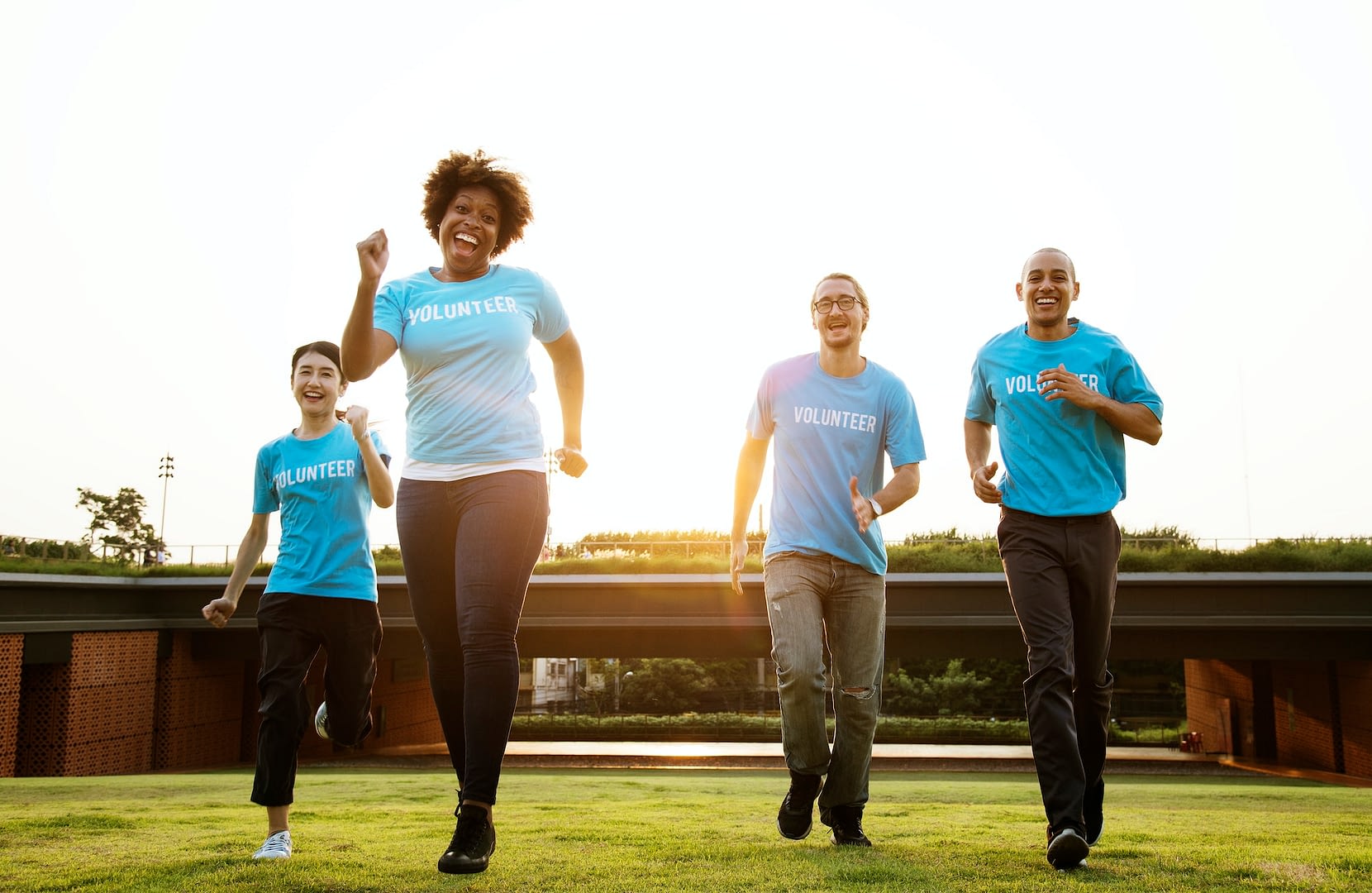 group of happy and diverse volunteers