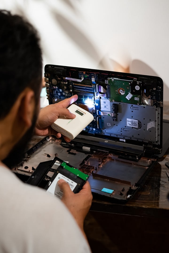 service and maintenance of the laptop using flashlight